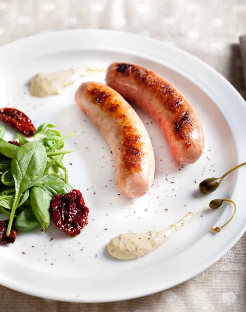 Grilled sausage with salad