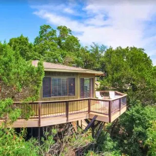 This Treehouse on the lake is one of the romantic cabins in Texas