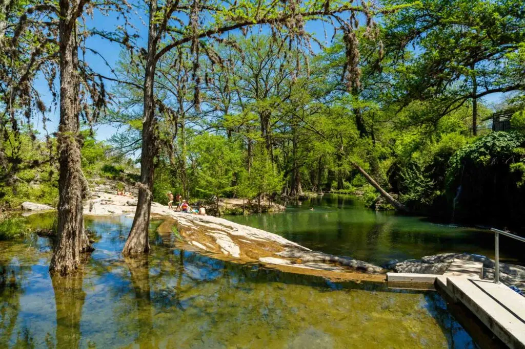 Soaking in the Swimming Hole at Krause Springs is one of the things to add to your Texas bucket list