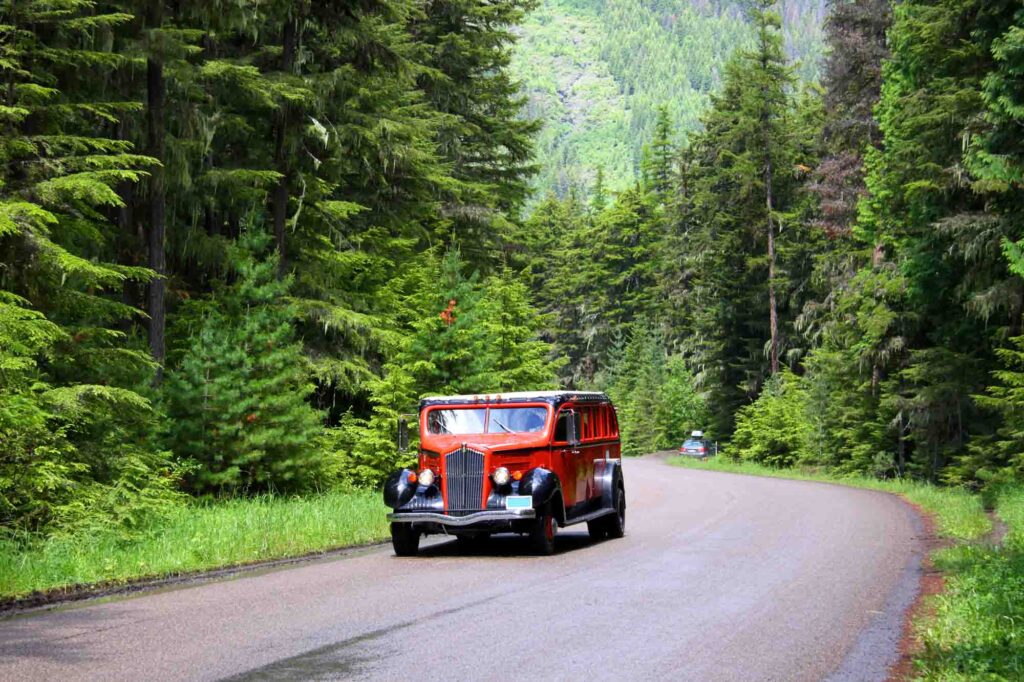 Riding the Red bus is one of the cool things to do in Glacier National Park