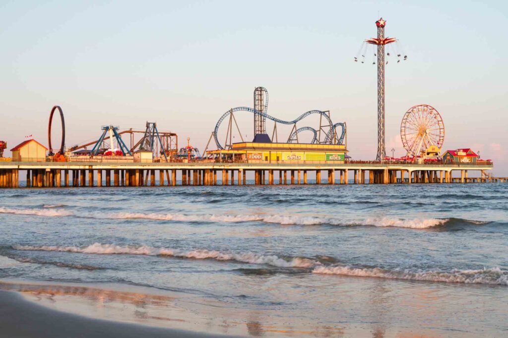 Flying over the water at Pleasure Pier is one of the fun things to do in Texas