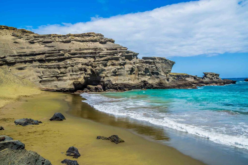 Gazing at the Papakōlea Green Sand Beach is one of the best things to do on Big Island, Hawaii