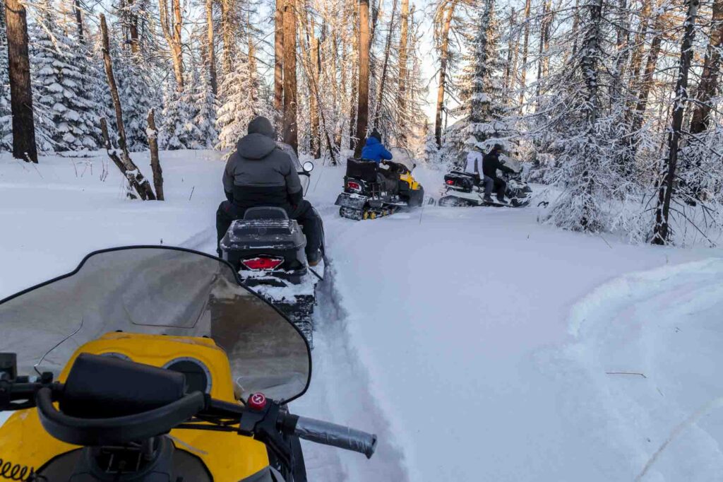 Snowmobiling is one of the fun things to do in winter in Maine
