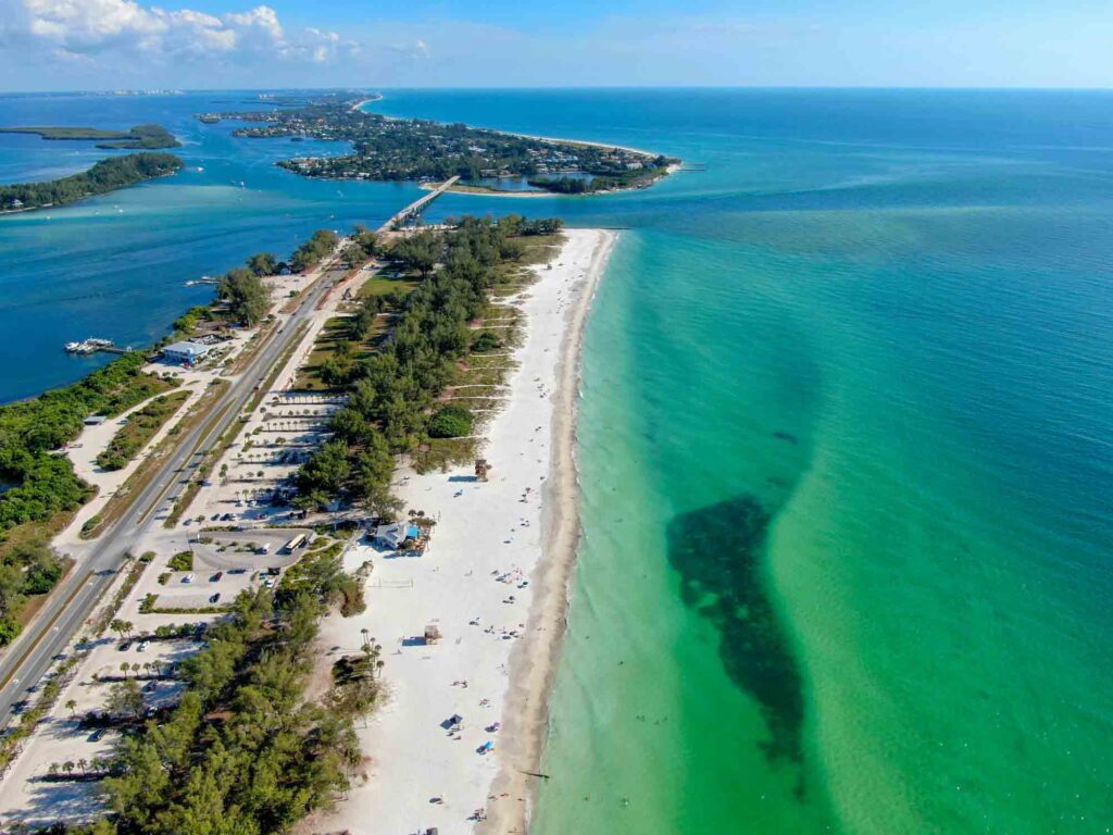 Aerial shot of the beautiful white sands of Coquina beach on Anna Maria Island