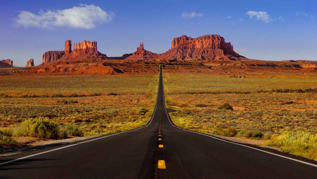 long road through the epic Monument Valley in Arizona