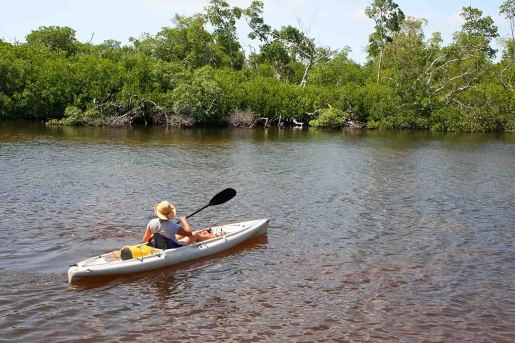 A woman kayaking at Sanibel Island