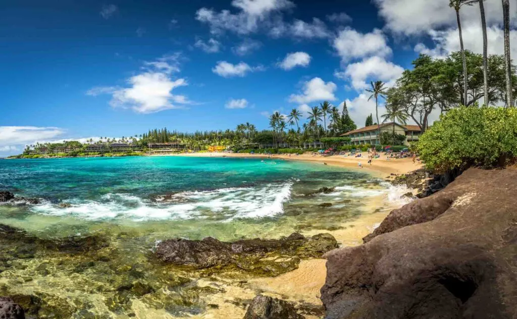 Napili beach in Hawaii with beach goers by the beach