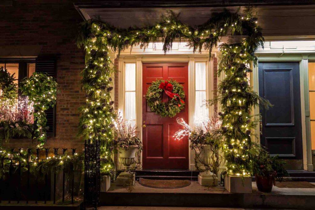 Welcoming Christmas decorations by the door