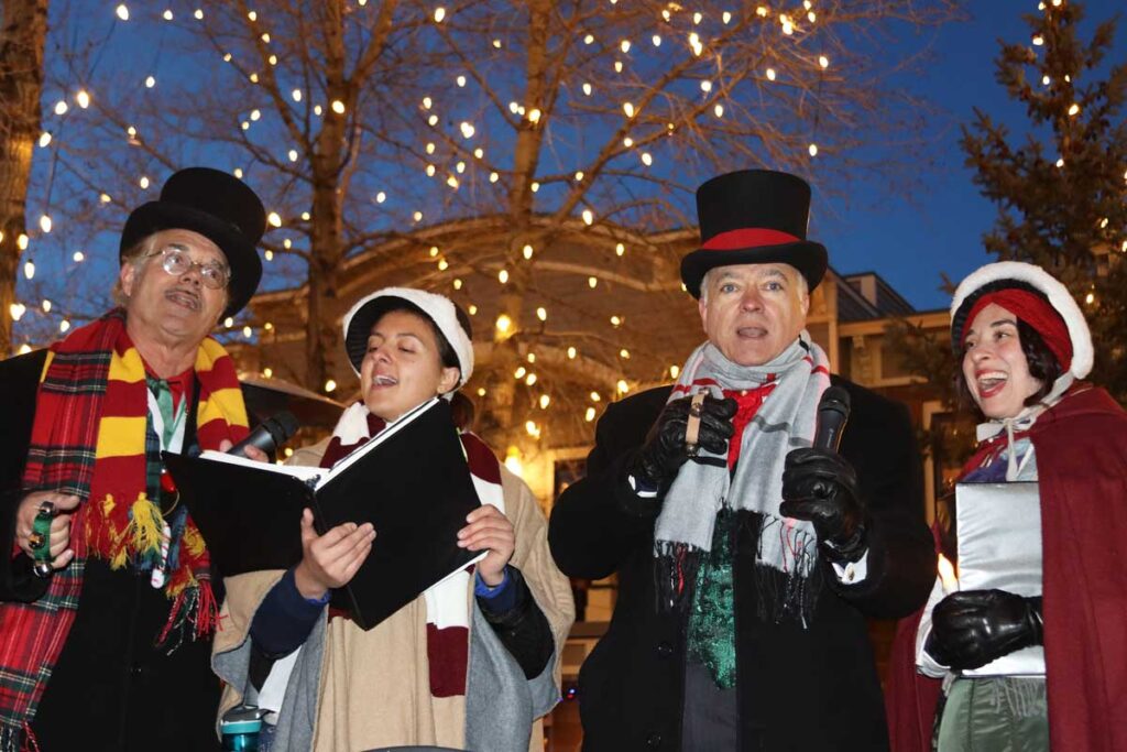 Carolers in Victorian-themed costume