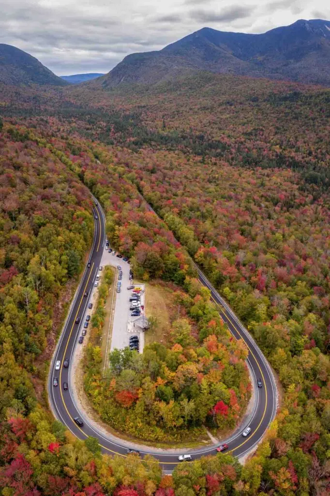 An aerial view of the hair pin turn on the Kancamagus Highway, New Hampshire, during fall
